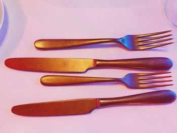 High angle view of objects on table against white background