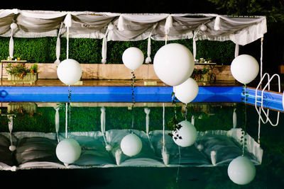 White balloons hanging