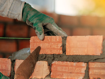 Close-up of man working at construction site