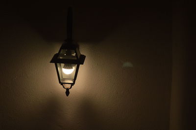 Close-up of illuminated electric lamp