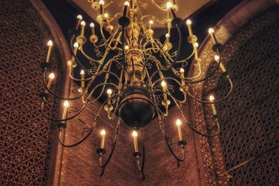 Low angle view of illuminated chandelier