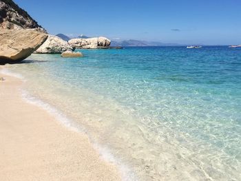 View of beach against blue sky