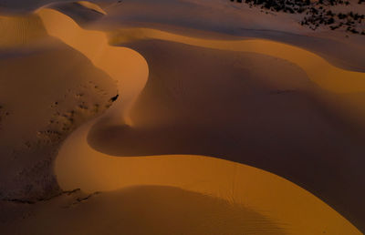 High angle view of sand dune on beach