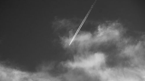 Low angle view of vapor trail against sky