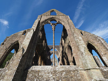 Low angle view of old building against sky