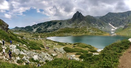 Panoramic view of lake and mountains against sky