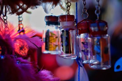 Close-up of flower glass hanging in container