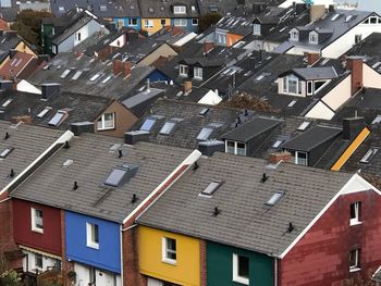 Houses in town against sky