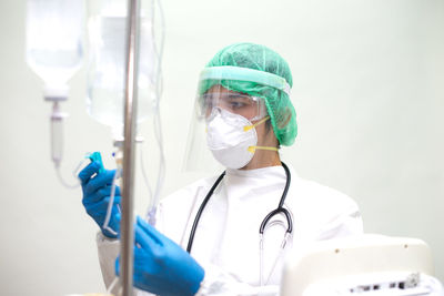 Portrait of man wearing mask