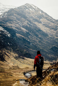 Tourists hiking on mountain