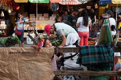 People at market stall