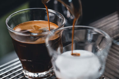 Close-up of coffee cup on table