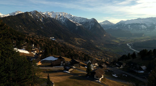 High angle view of mountain range against cloudy sky