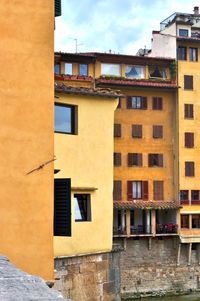 Buildings in city against sky