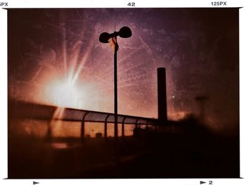 Low angle view of street light against sky