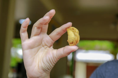 Close-up of woman holding ice cream