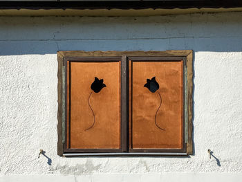 Closed window of old building