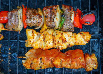 Close-up of meat on barbecue grill