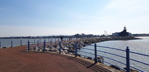 Pier on sea against sky