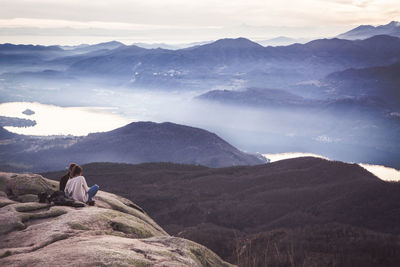 Scenic view of people on mountain