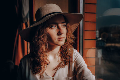 Young woman wearing hat