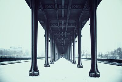 Underneath view of bridge during winter