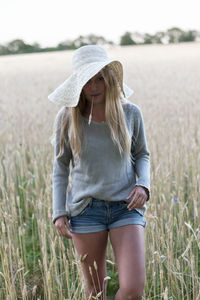 Teenage girl on wheat field