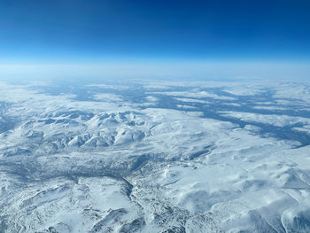 Panoramic view on the snowy mountain tops in norway