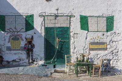 Chairs against building