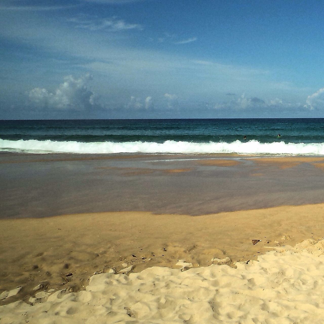 beach, sea, sand, water, shore, horizon over water, tranquil scene, sky, tranquility, scenics, beauty in nature, nature, idyllic, coastline, cloud - sky, wave, cloud, blue, day, remote