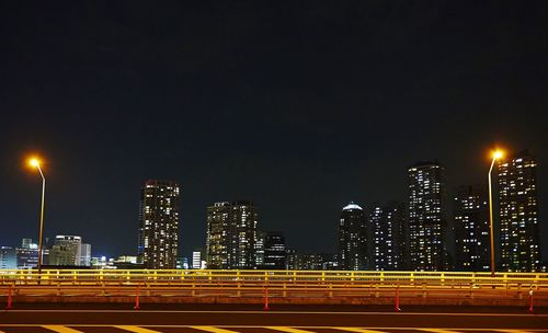 Illuminated cityscape at night