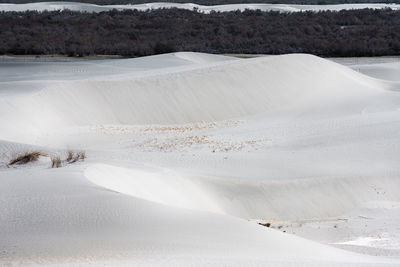 Aerial view of snow covered land