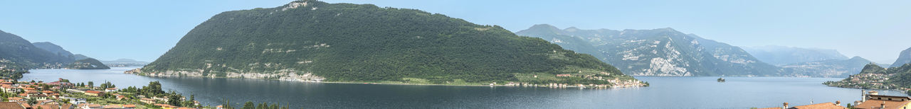 Extra wide view of monte isola in the lake iseo