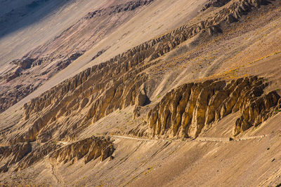 Aerial view of landscape with mountain range in the background