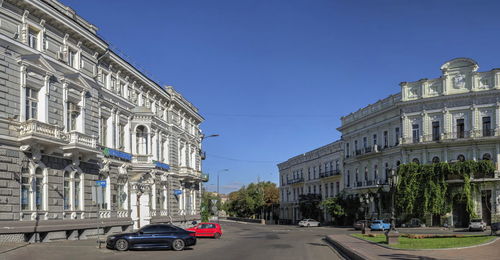 People in front of historic building