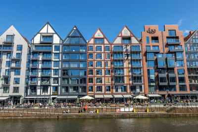 View of buildings against blue sky
