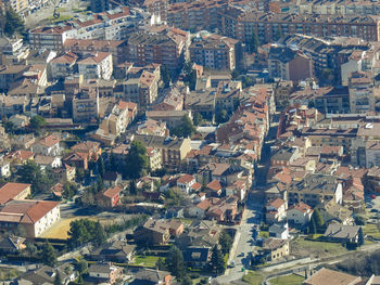 High angle view of illuminated buildings in town