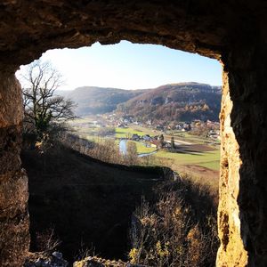 Scenic view of landscape and mountains against sky