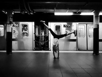 Man standing at subway station