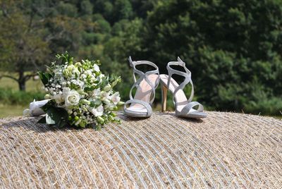 Bouquet with sandal on hay bale