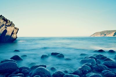 Scenic view of sea against clear sky