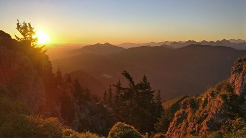 Scenic view of mountains against sky during sunset