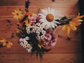 High angle view of flowering plant in vase on table