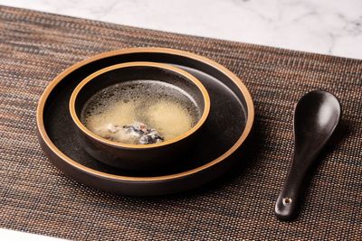 High angle view of tea served on table