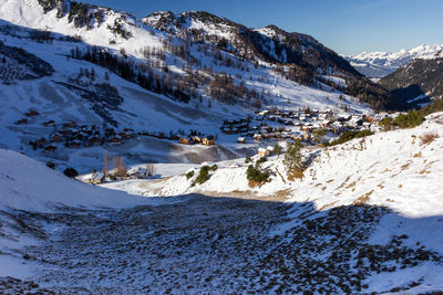 Scenic view of snow covered mountains