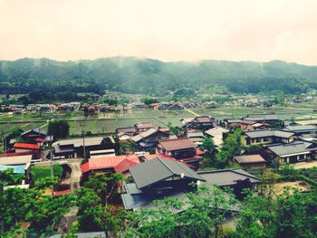 High angle view of houses against sky