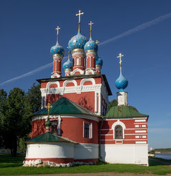 Low angle view of church against blue sky