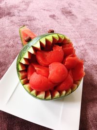 High angle view of fruits in plate on table