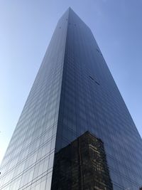 Low angle view of modern building against sky