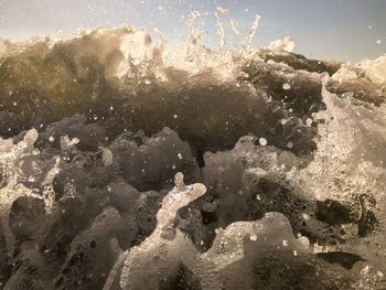 Close-up of hands in water